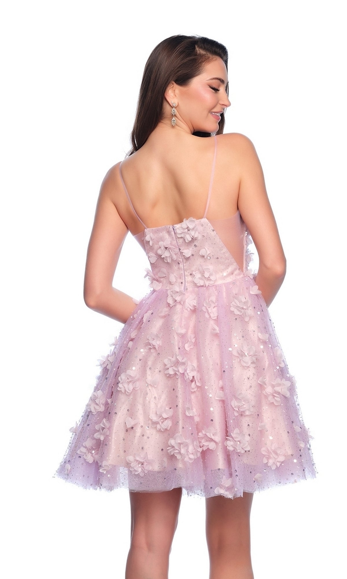A woman shown from the back wears the Dave and Johnny Short Purple Hoco Dress 11751—a sleeveless A-line party dress with thin straps and floral appliqués.